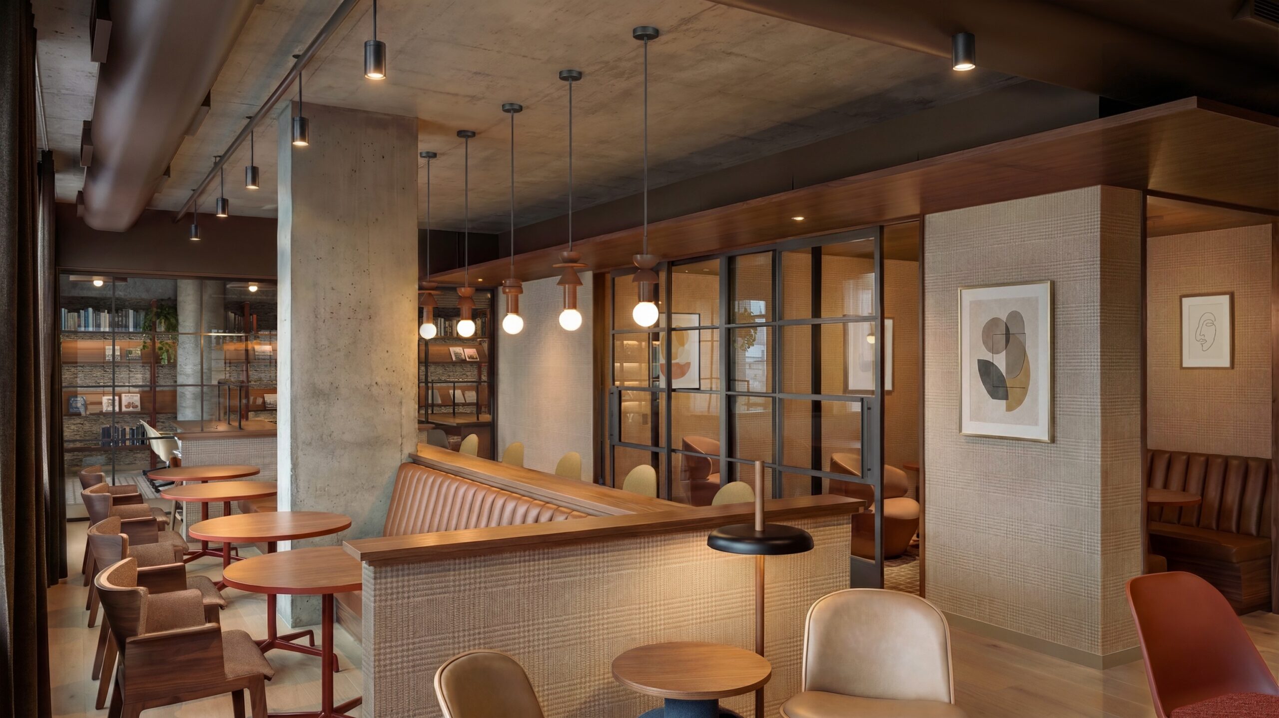 Coworking and library floor with private meeting rooms