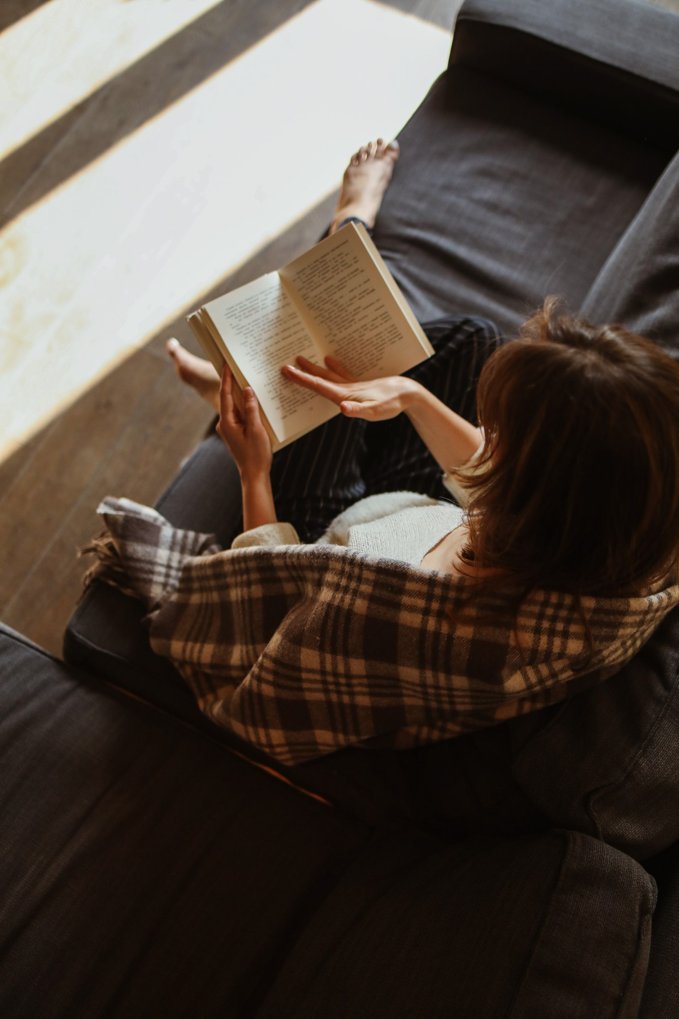 Young woman reading a book